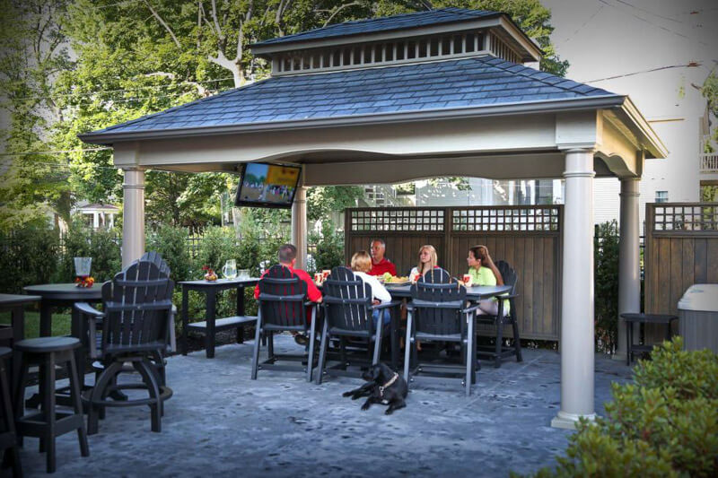 bar and big-screen TV in poolside pavilion