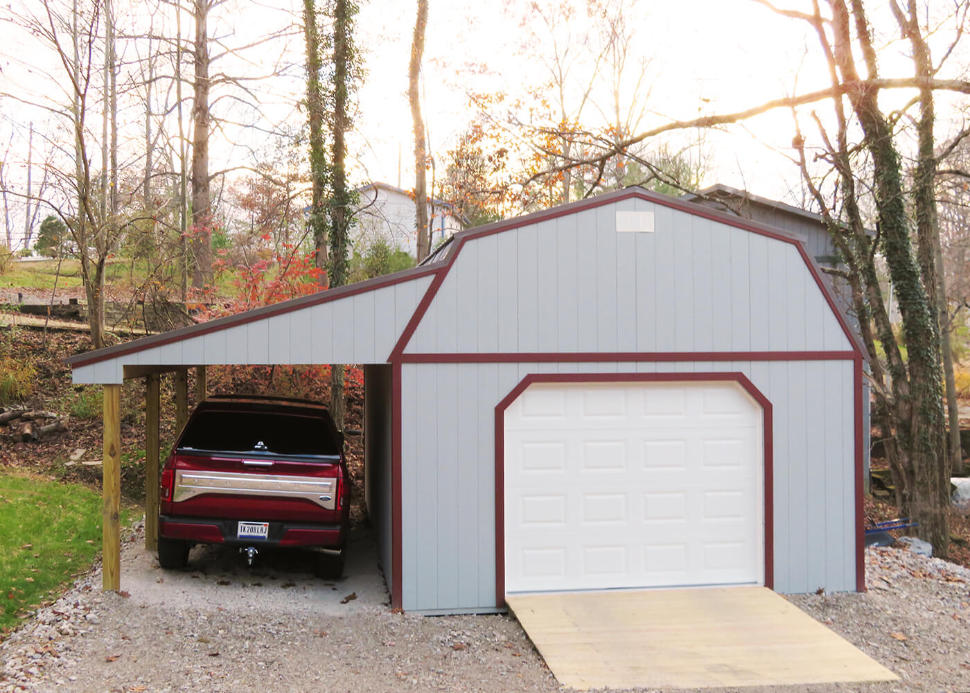 16 x 24 8' Sidewall Barn Zook Gray siding, Red trim, Charcoal metal roof - Shown with 9 x 7 garage door, optional ramp and 9' lean-to