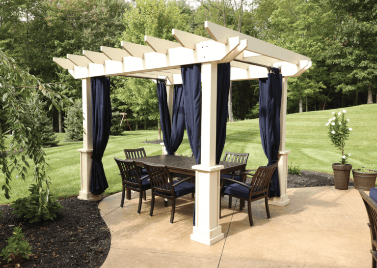 Wooden Pergola White Mendoze pergola with curains,Mendoza Pergola with grandfather posts, custom privacy wall and dia-shade curtains,Mocha colored Mendoze Pergola,Mendoza Pergola by Miller's Mini Barns,Mendoza Pergola by Miller's Mini Barns